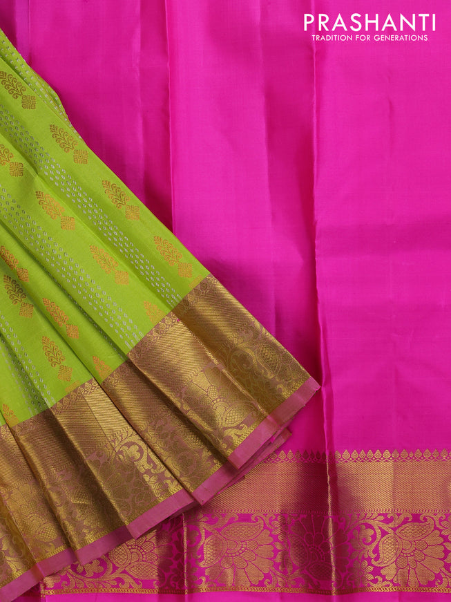 Pure silk kids lehenga lime green and pink with allover silver zari weaves & copper zari buttas and zari woven border