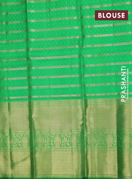 Pure silk kids lehenga dual shade of pink and light green with allover zari checks & buttas and long zari woven border