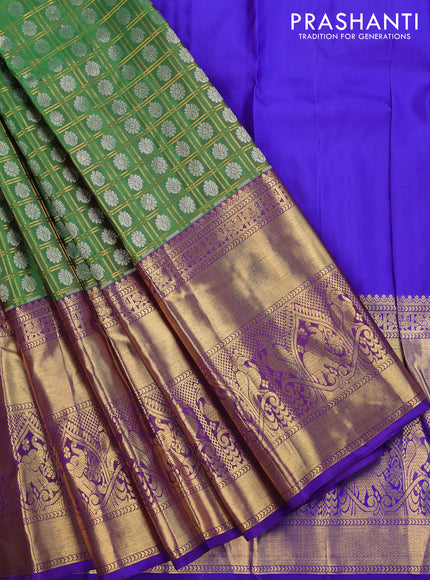 Pure silk kids lehenga green and blue with allover zari checks & zari buttas and long zari woven border