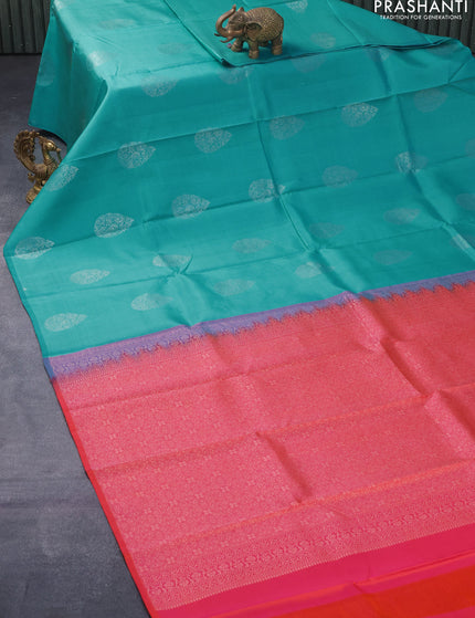 Pure kanjivaram silk saree teal blue and dual shade of pinkish orange with silver zari woven buttas in borderless style