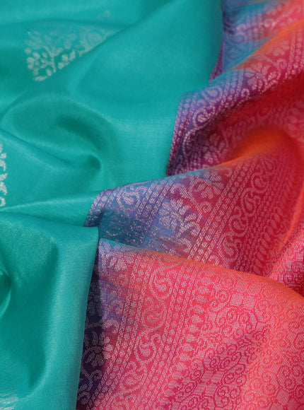 Pure kanjivaram silk saree teal blue and dual shade of pinkish orange with silver zari woven buttas in borderless style