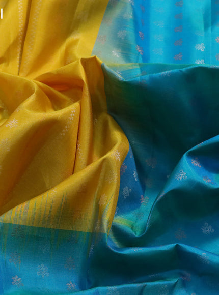 Pure soft silk saree yellow and dual shade of teal blue with silver & copper zari weaves and zari woven butta border