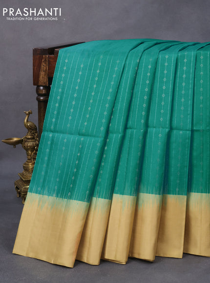 Pure soft silk saree teal blue and sandal with silver & copper zari weaves and zari woven butta border