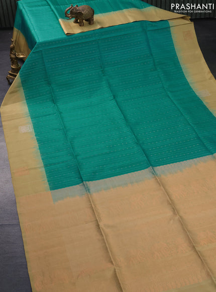 Pure soft silk saree teal blue and sandal with silver & copper zari weaves and zari woven butta border