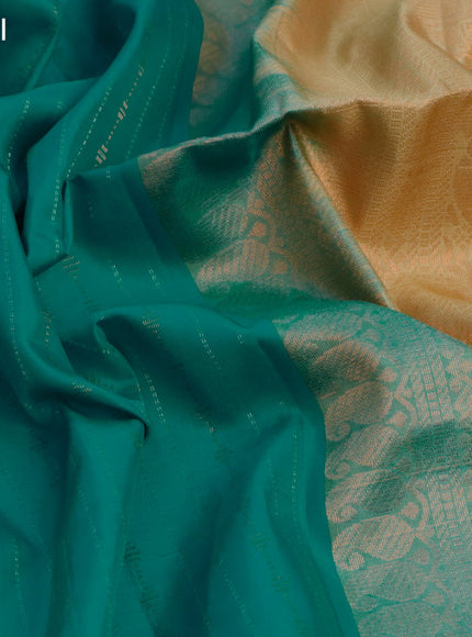 Pure soft silk saree teal blue and sandal with silver & copper zari weaves and zari woven butta border