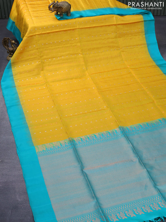 Pure soft silk saree yellow and teal blue with silver & copper zari checks buttas and simple border