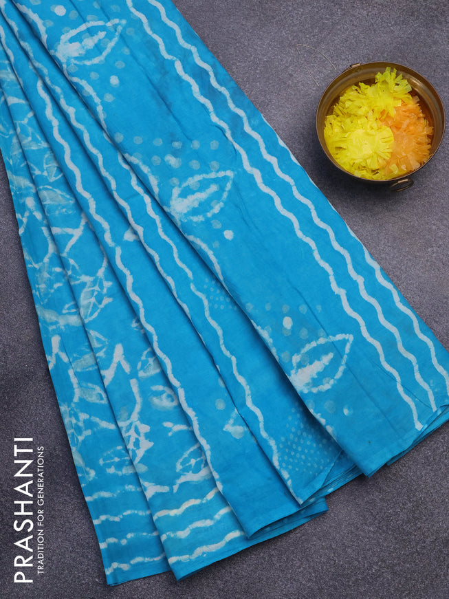 Jaipur cotton saree teal blue with allover batik prints and printed border