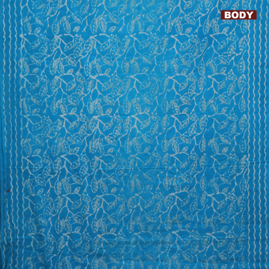 Jaipur cotton saree teal blue with allover batik prints and printed border