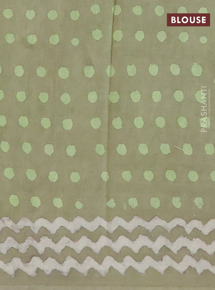 Jaipur cotton saree pastel green shade with allover prints and printed border