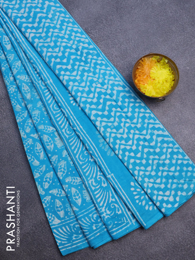 Jaipur cotton saree teal blue shade with allover prints and printed border