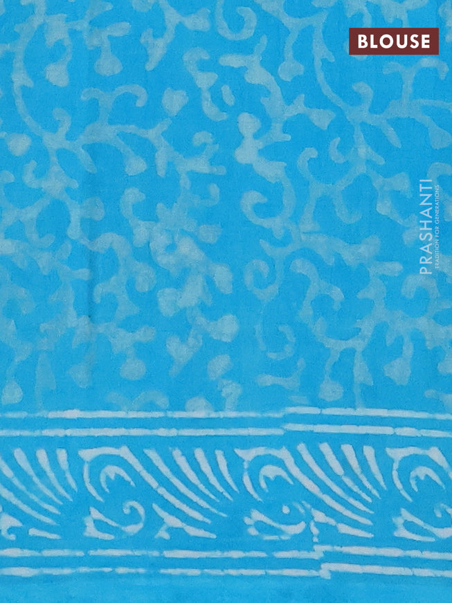Jaipur cotton saree teal blue shade with allover prints and printed border