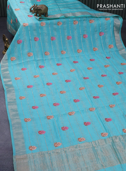 Semi chanderi saree teal blue with allover zari stripes & embroidery buttas and zari woven border