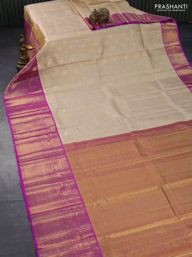 Pure kanjivaram tissue silk saree cream and purple with allover silver zari woven brocade weaves and long rich zari woven border