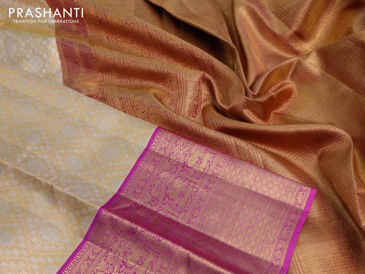 Pure kanjivaram tissue silk saree cream and purple with allover silver zari woven brocade weaves and long rich zari woven border