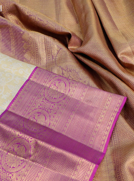 Pure kanjivaram tissue silk saree cream and purple with allover silver zari woven brocade weaves and long rich annam zari woven border