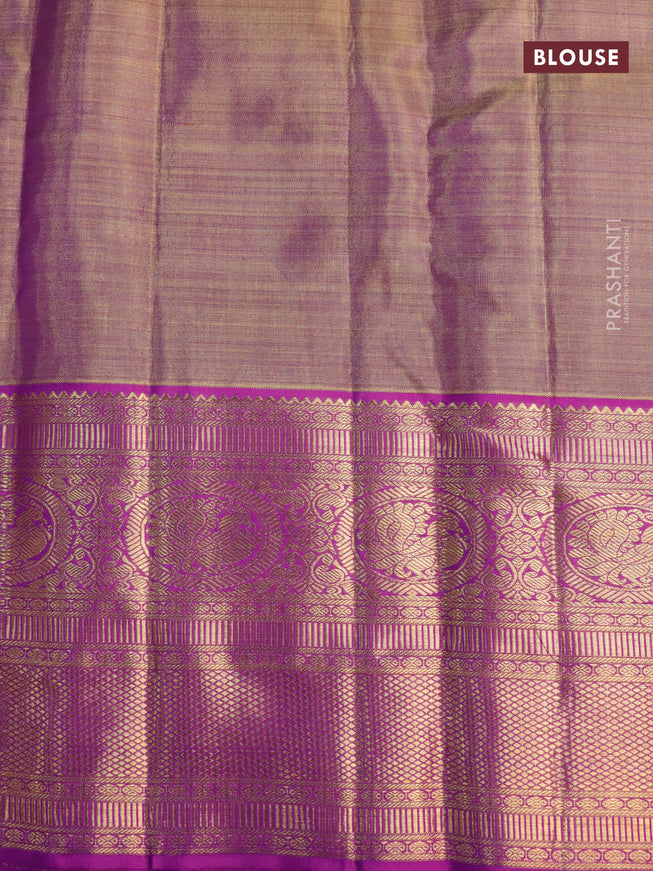 Pure kanjivaram tissue silk saree cream and purple with allover silver zari woven brocade weaves and long rich annam zari woven border