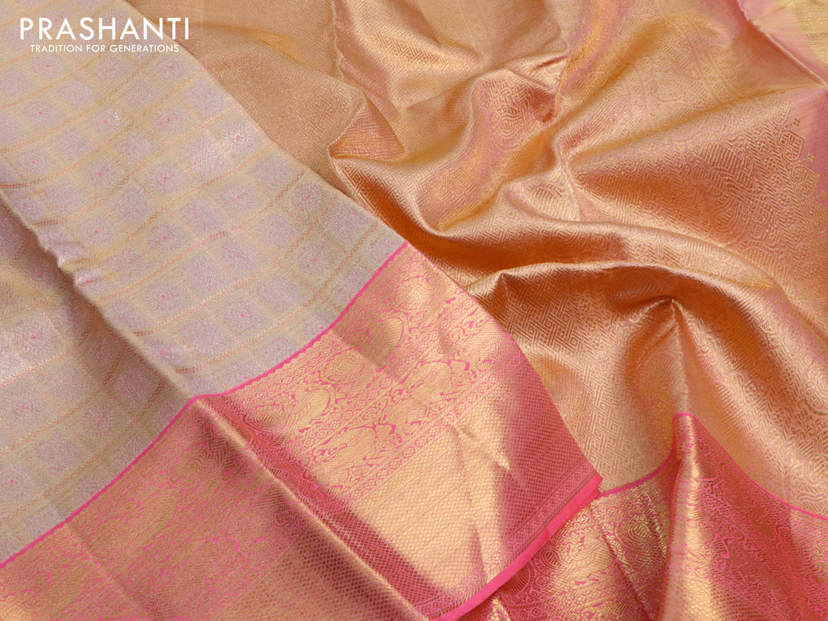 Pure kanjivaram tissue silk saree gold and peach pink with allover zari checked pattern & annam mayil chakaram buttas and long rich zari woven border