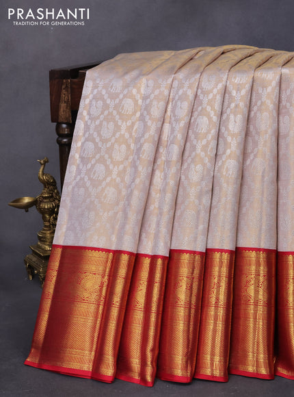 Pure kanjivaram tissue silk saree cream and red with allover silver zari woven brocade weaves and long rich annam zari woven border