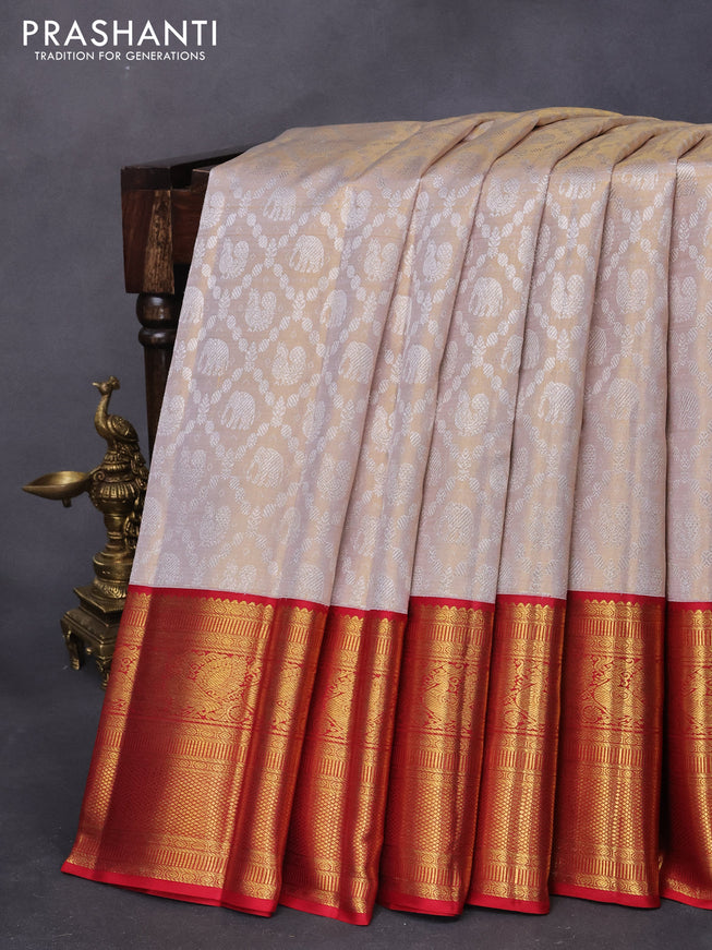 Pure kanjivaram tissue silk saree cream and red with allover silver zari woven brocade weaves and long rich annam zari woven border