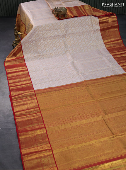 Pure kanjivaram tissue silk saree cream and red with allover silver zari woven brocade weaves and long rich annam zari woven border