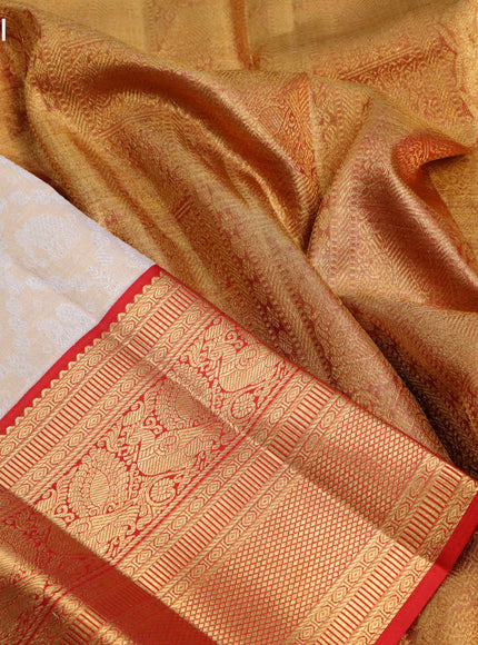 Pure kanjivaram tissue silk saree cream and red with allover silver zari woven brocade weaves and long rich annam zari woven border