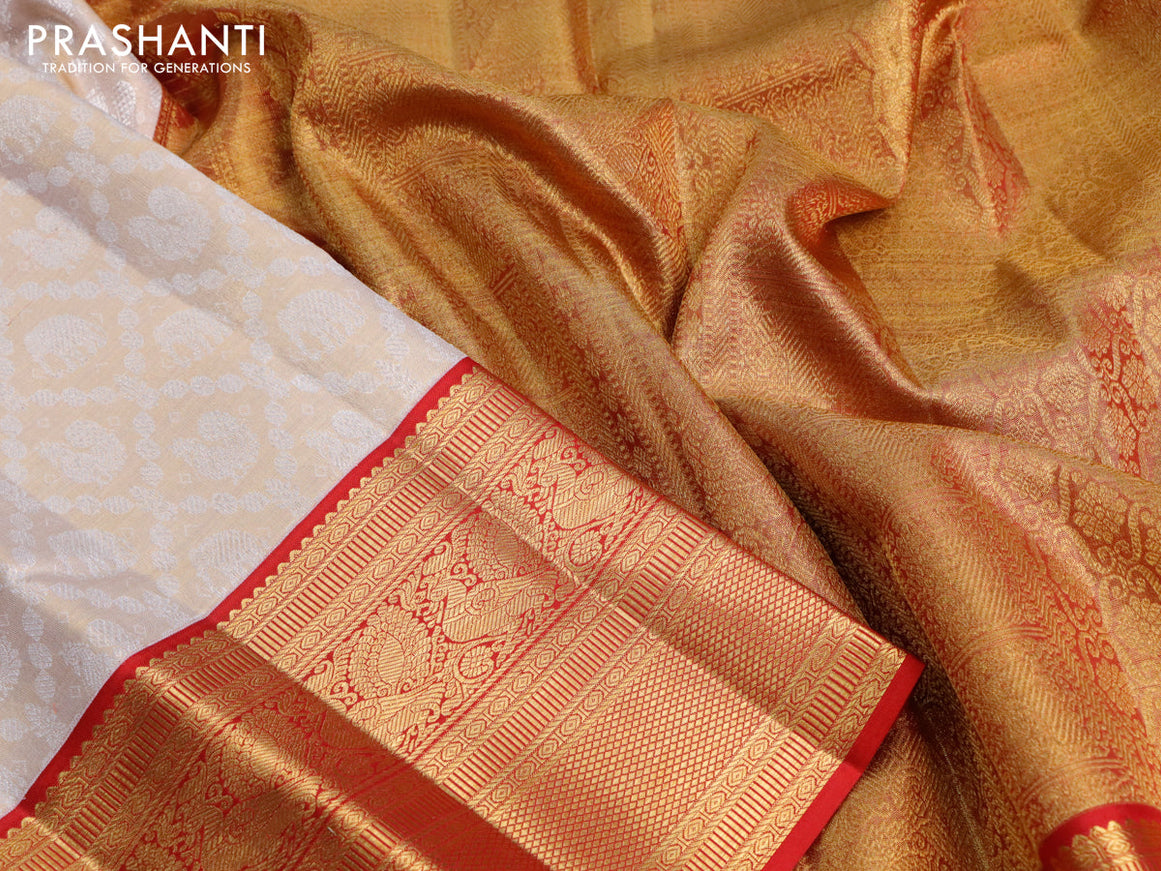 Pure kanjivaram tissue silk saree cream and red with allover silver zari woven brocade weaves and long rich annam zari woven border