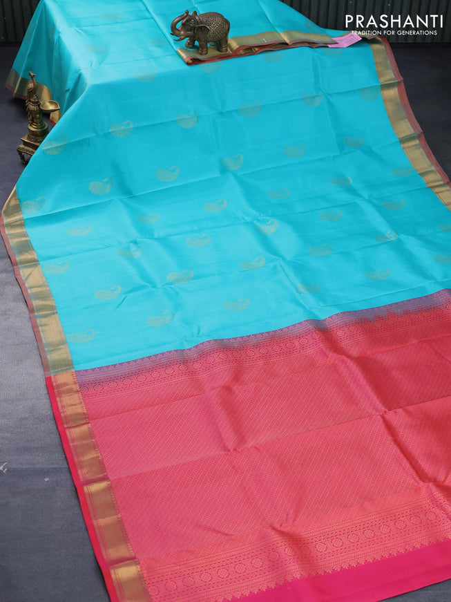 Pure kanjivaram silk saree teal blue and dual shade of pinkish orange with zari woven paisley buttas and zari woven border