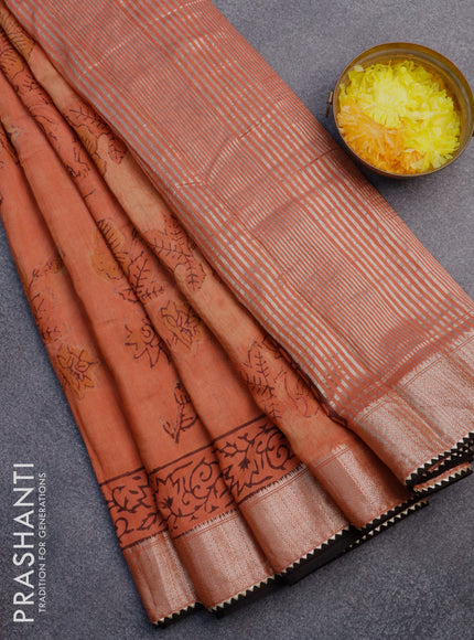 Chanderi silk cotton saree rustic orange and black with natural vegetable prints and zari woven gotapatti lace border