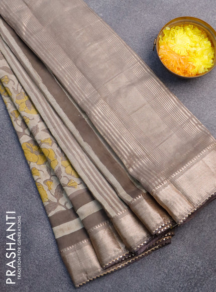 Chanderi silk cotton saree beige and grey with natural vegetable prints and zari woven gotapatti lace border