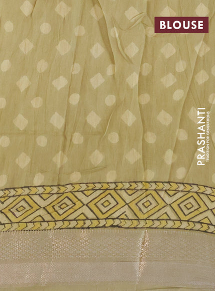 Chanderi silk cotton saree elaichi green and black with natural vegetable prints and zari woven gotapatti lace border