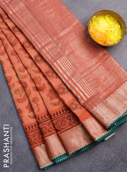 Chanderi silk cotton saree rustic oramge and green with natural vegetable prints and zari woven gotapatti lace border