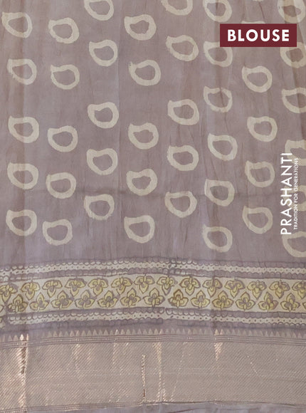 Chanderi silk cotton saree beige shade and grey with natural vegetable prints and zari woven gotapatti lace border