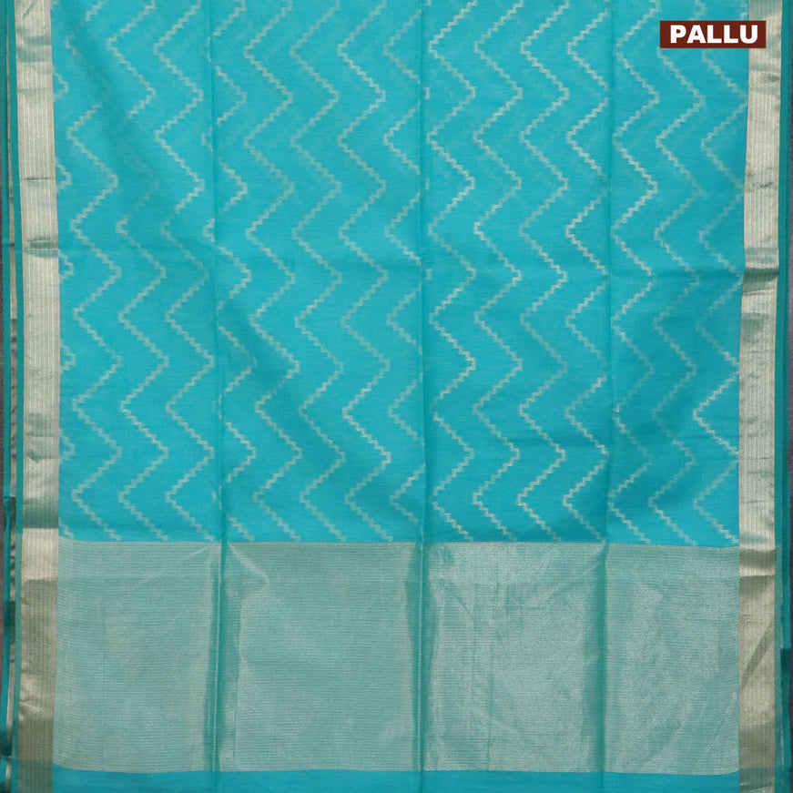 Semi dupion saree teal blue with allover zig zag weaves and zari woven border