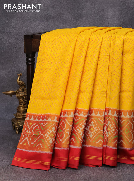 Rajkot patola silk saree yellow and red with allover ikat weaves and ikat woven zari border