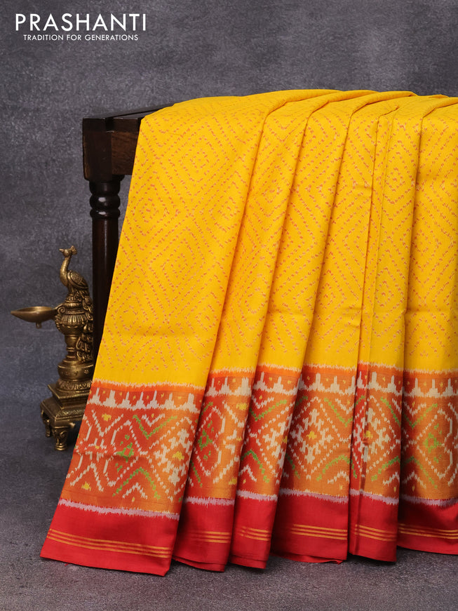 Rajkot patola silk saree yellow and red with allover ikat weaves and ikat woven zari border