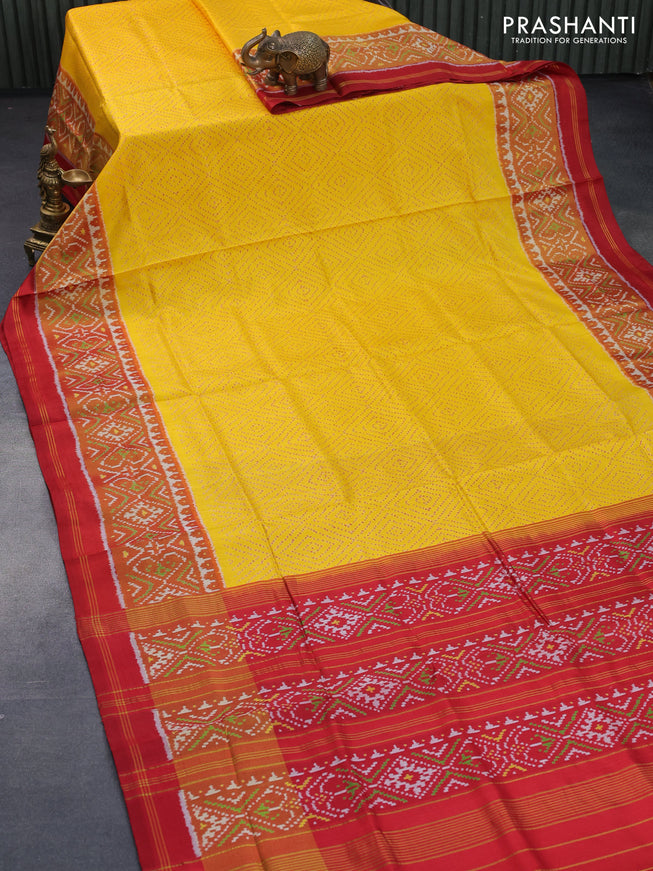 Rajkot patola silk saree yellow and red with allover ikat weaves and ikat woven zari border