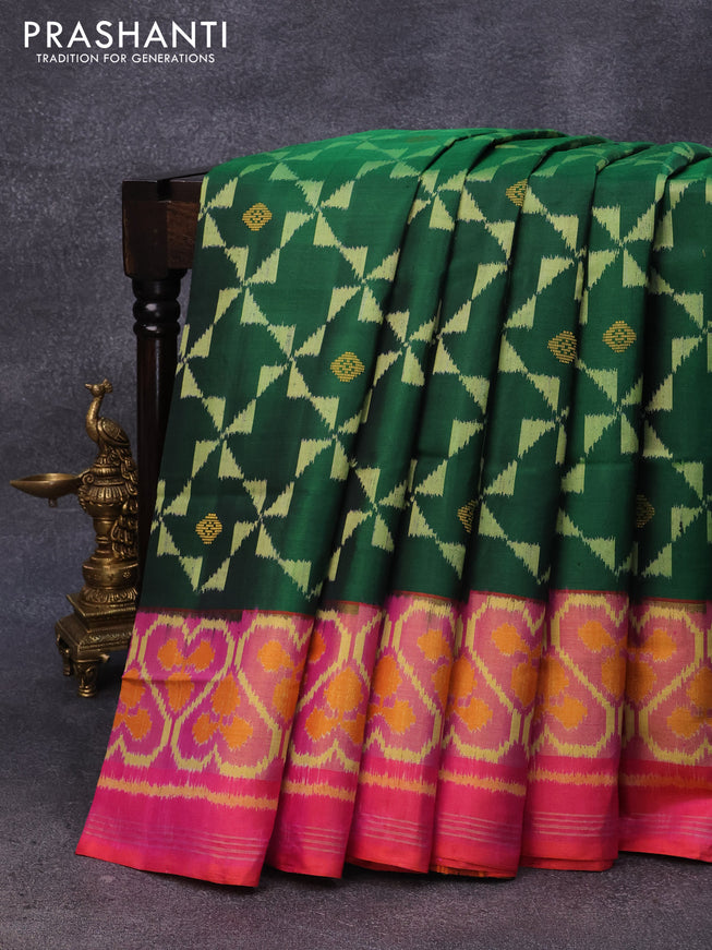 Rajkot patola silk saree green and dual shade of pinkish orange with allover ikat weaves & zari buttas and ikat woven zari border