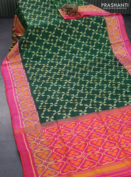 Rajkot patola silk saree green and dual shade of pinkish orange with allover ikat weaves & zari buttas and ikat woven zari border