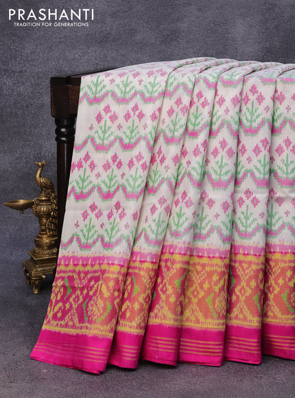 Rajkot patola silk saree off white and pink with allover ikat weaves and ikat woven zari border