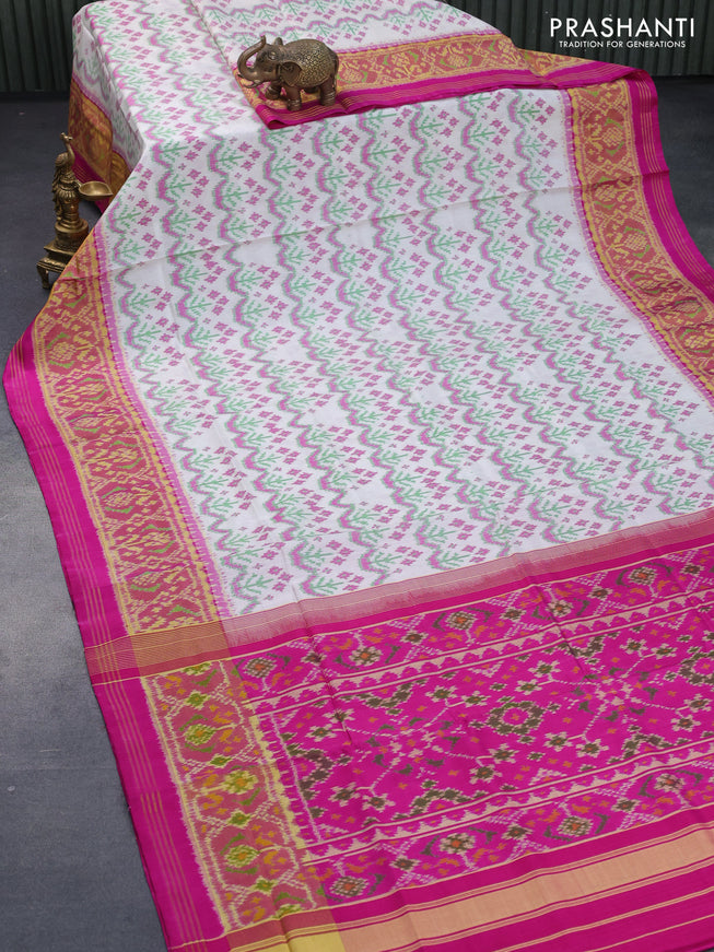 Rajkot patola silk saree off white and pink with allover ikat weaves and ikat woven zari border