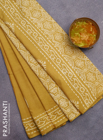 Pashmina silk saree mustard yellow with butta prints and printed border