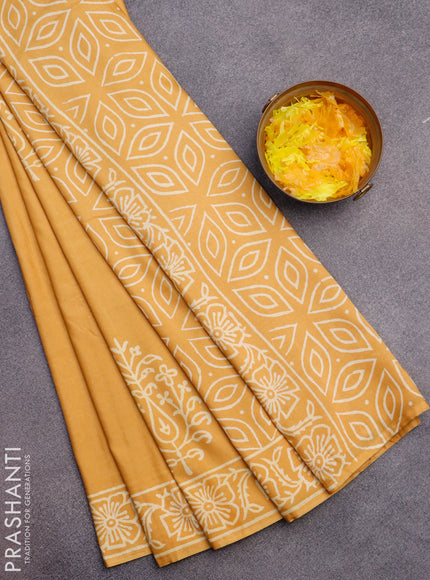 Pashmina silk saree mustard yellow with butta prints and printed border