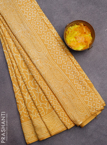 Pashmina silk saree mustard yellow with allover floral prints and printed border