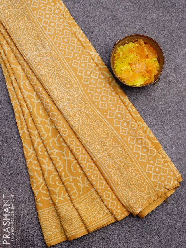 Pashmina silk saree mustard yellow with allover floral prints and printed border