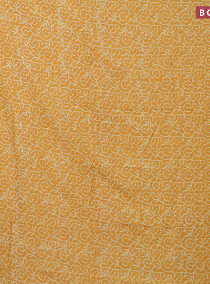 Pashmina silk saree mustard yellow with allover floral prints and printed border