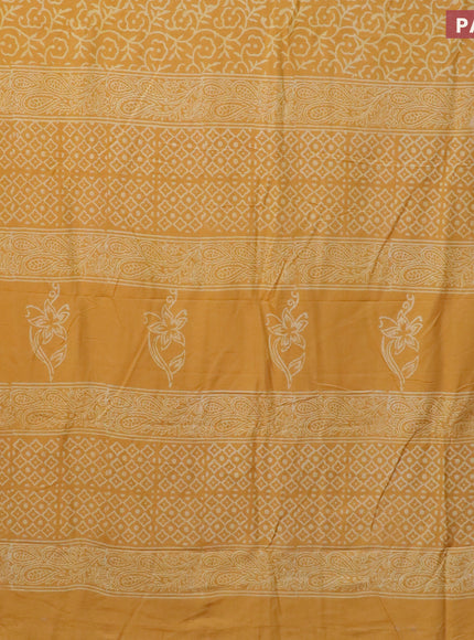 Pashmina silk saree mustard yellow with allover floral prints and printed border