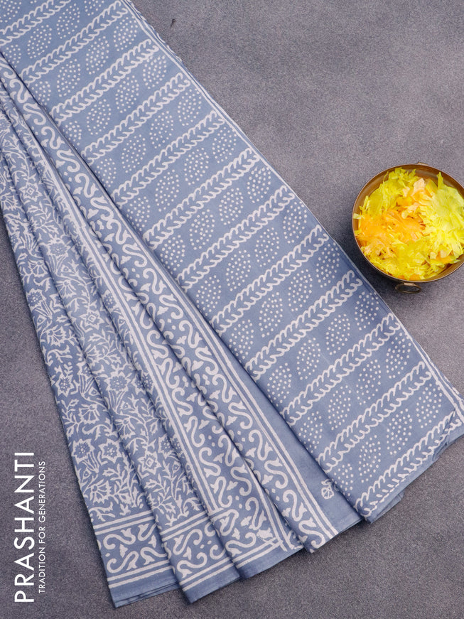 Pashmina silk saree pastel grey with allover prints and printed border