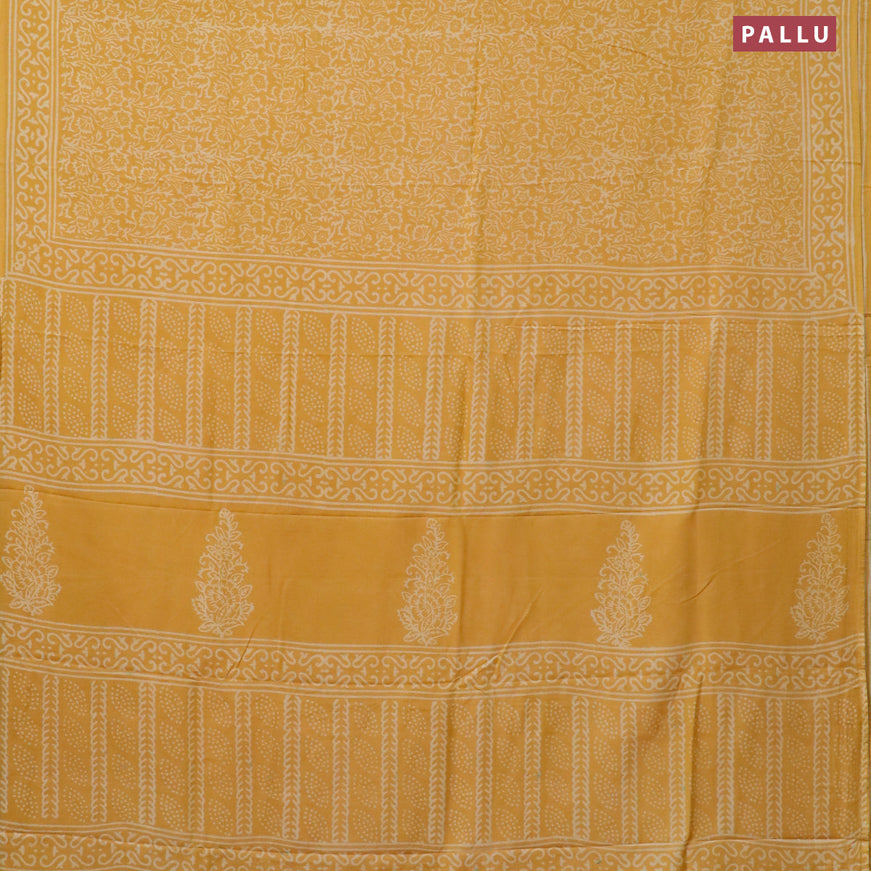 Pashmina silk saree yellow with allover prints and printed border