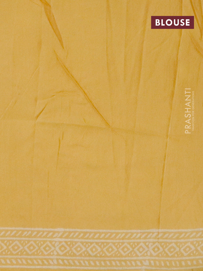 Pashmina silk saree yellow with allover warli prints and printed border