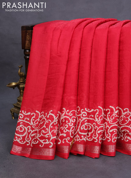 Semi crepe saree red with allover self emboss and batik printed border